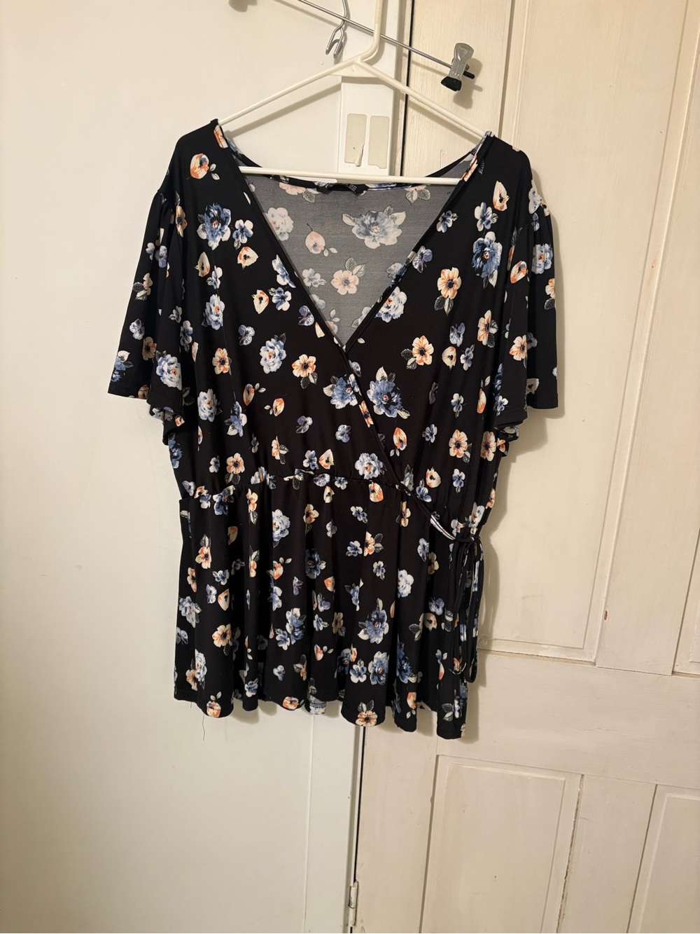 BloomChic Black Floral Wrap Top with Blue and Cream Blooms